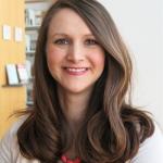 Smiling woman with long brown hair